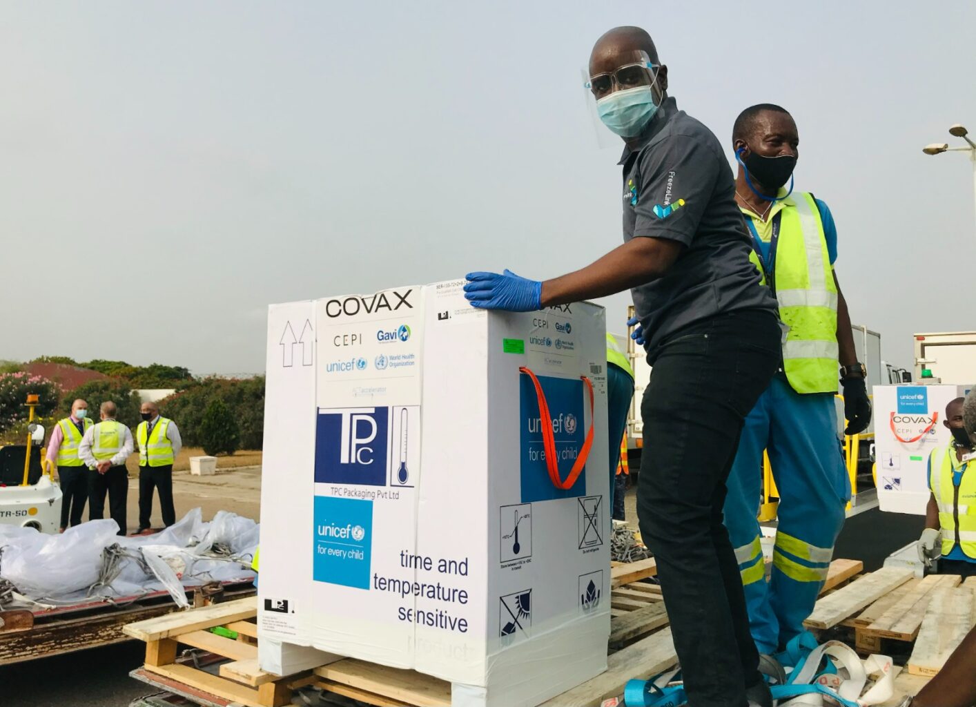 Photo 2: Owusu and team aide in delivering COVAX Vaccine in Ghana